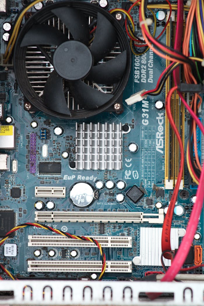 The Art of Drawing Readers In: Your attractive post title goes here Detailed photo of a computer's internal components and wiring.